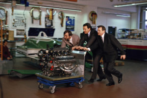 Hans-Joachim Esch, Helmut Flegl and Hans Mezger (f.l.t.r.) with the engine Type 2708, 1990.
